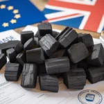 Premium export-ready charcoal meeting UK and EU quality standards with certification documents and testing equipment